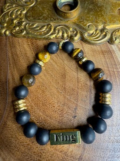 King Charm Bracelet: A Regal A Regal Accessory for Every Occasion