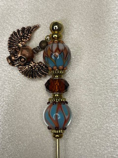 Hand Blown Glass Turquoise and Brown with winged skull-Cigar And Spirits Magazine